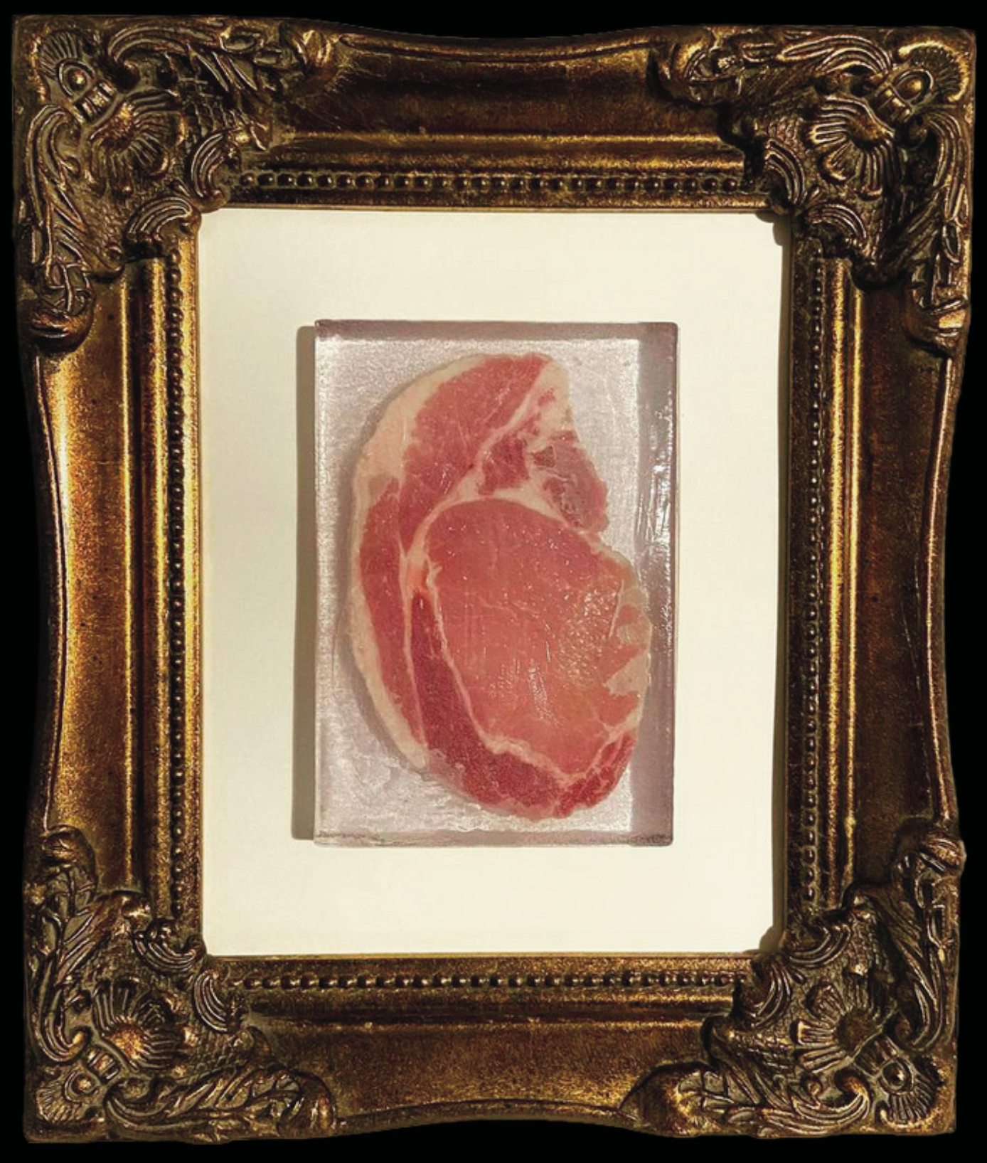 click to expand portrait of a long pig / resin and pork steak / 2023